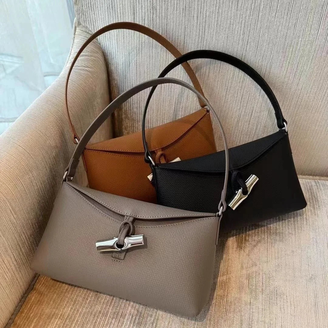 The 2024 new women's bag is a fashionable, high-end, retro, versatile handbag, shoulder and underarm bag, and a small square bag