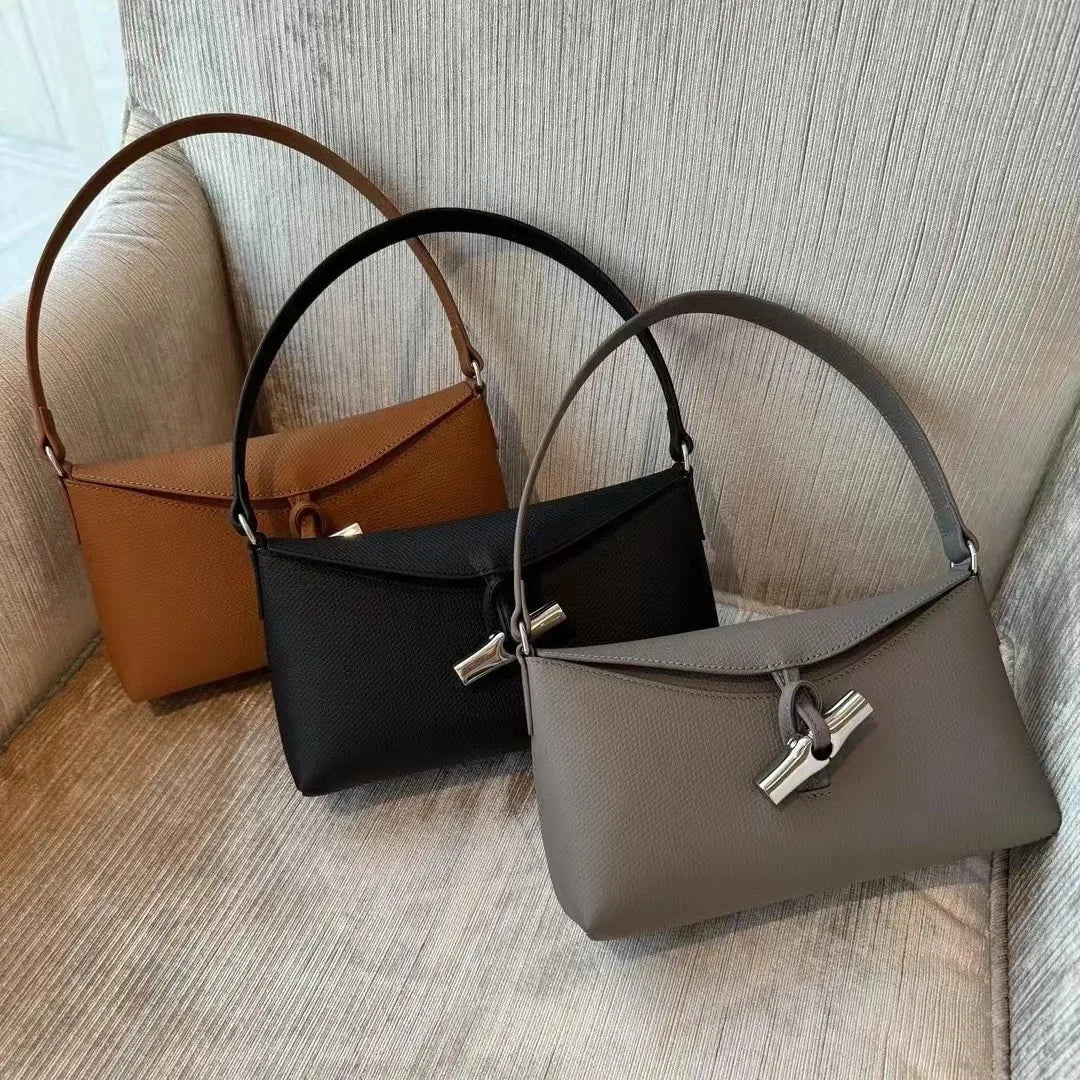 The 2024 new women's bag is a fashionable, high-end, retro, versatile handbag, shoulder and underarm bag, and a small square bag