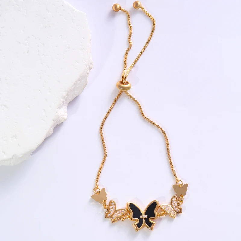 A delicate bracelet features multiple butterfly-shaped decorations set with zirconia, making it fashionable and versatile.