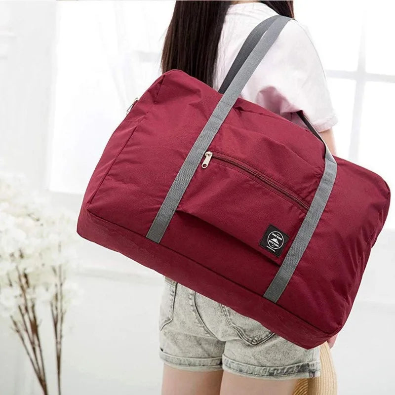 Fashionable Foldable Travel Bag: Large Capacity, Splash-Proof Carry-On Luggage Duffle Bag for Holiday Trips & Unisex Fitness