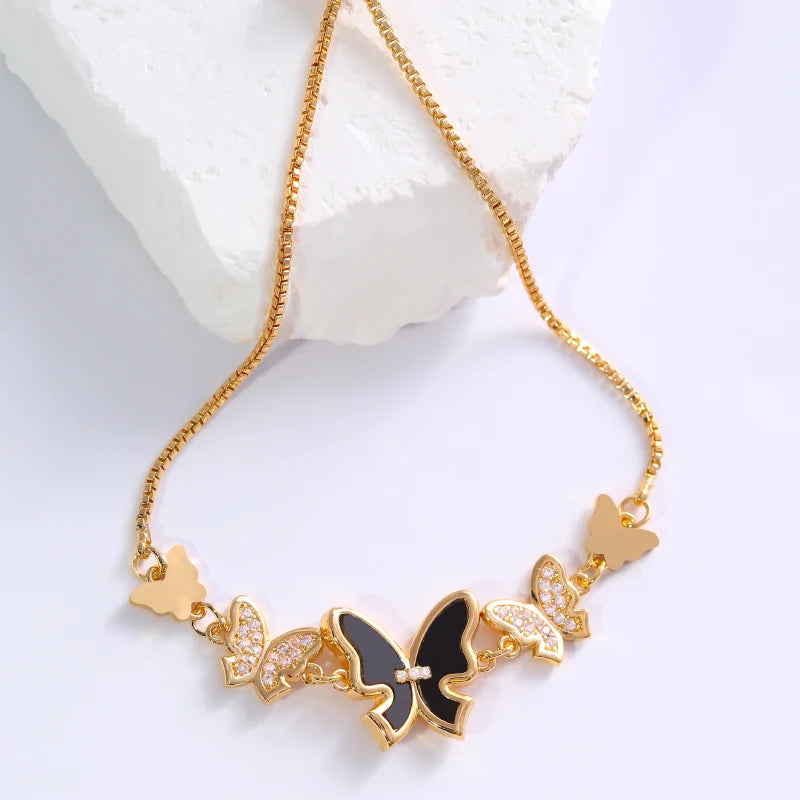 A delicate bracelet features multiple butterfly-shaped decorations set with zirconia, making it fashionable and versatile.